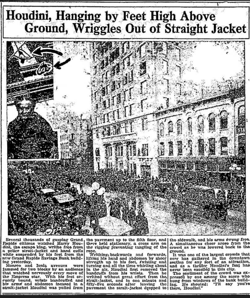 Grand Rapids Herald clipping of Houdini escaping a straitjacket above the new bank building in 1916
